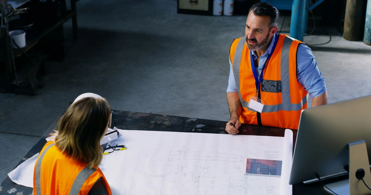 Workers using updated documentation after getting facility management printing resources