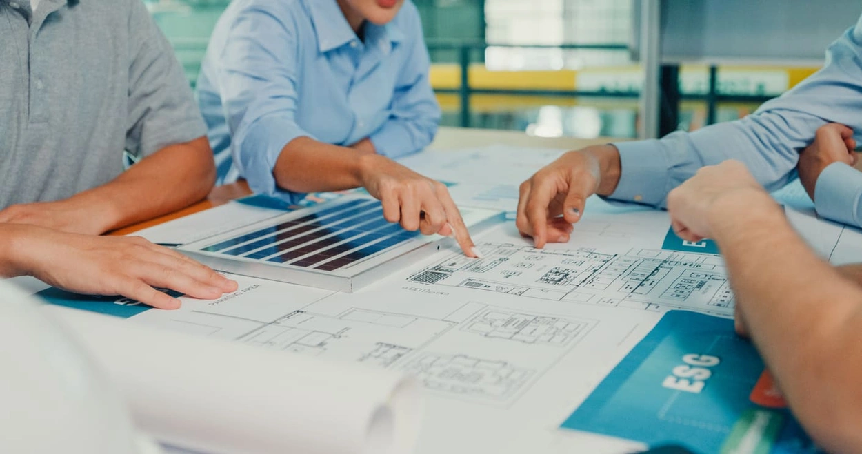 City planners discussing sustainable urban planning and printing initiatives