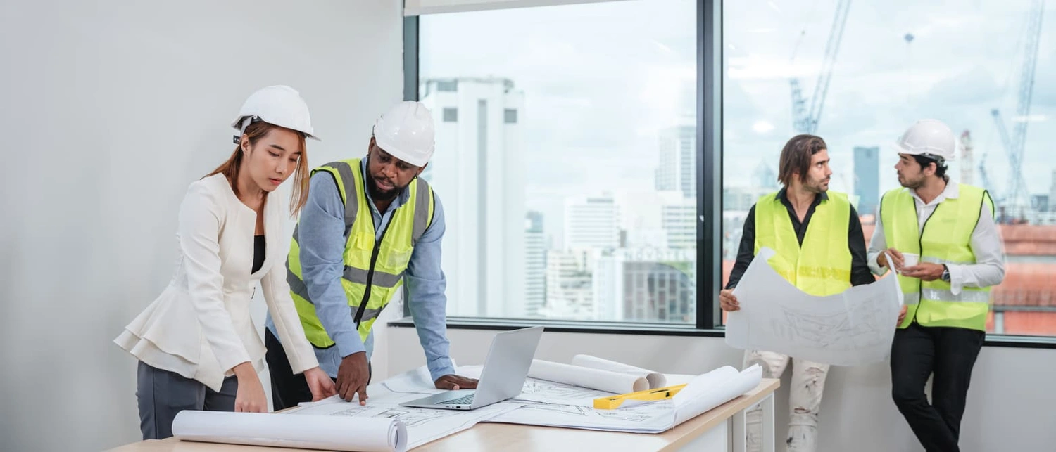 Busy construction and engineering team that needs to buy a plotter printer for each department Busy construction and engineering team that needs to buy a plotter printer for each department
