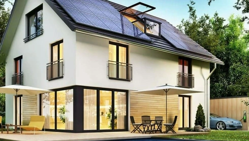 Sustainable house design house with solar panels on the roof and an electric vehicle